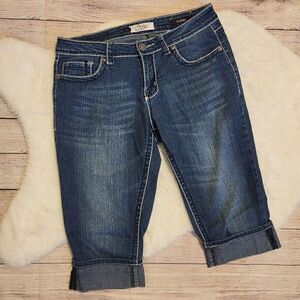 VGS cuffed jean capris with rhinestone detail on back pockets